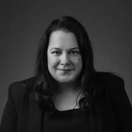 Attorneys 19 Black and white portrait photo of Thomas J. Henry Attorney Karen K. Villaruel