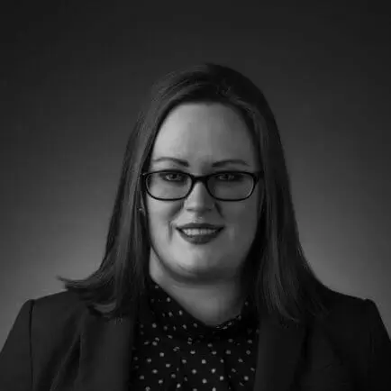 Home 39 Black and white portrait photo of Thomas J. Henry Attorney Robin Trevino