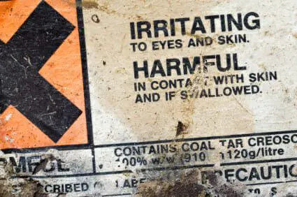 Carbon Monoxide Leaks in Ford Explorers May Lead to Large Recall 1 Label warning that on a container of creosote indicating it to be harmful and a chemical irritant.