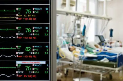 Study: Electronic Health Record Use Increasingly Cited as Contributing Factor in Medical Malpractice Claims 1 Patients in hospital bed with vital sign monitor in foreground.