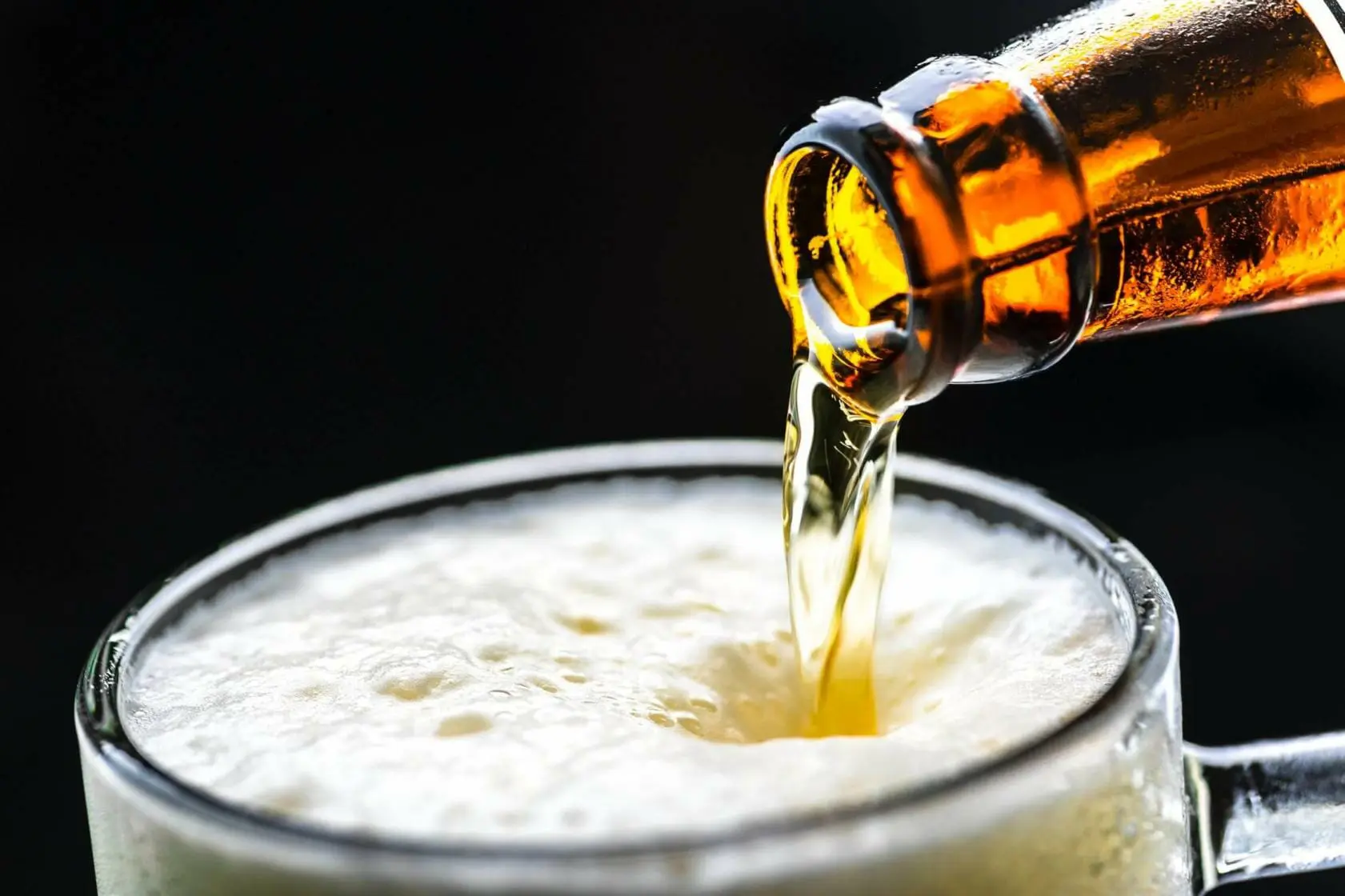 Woman Convicted of Intoxication Manslaughter Sentenced to 10 Years 1 Bottle of beer being poured into a mug