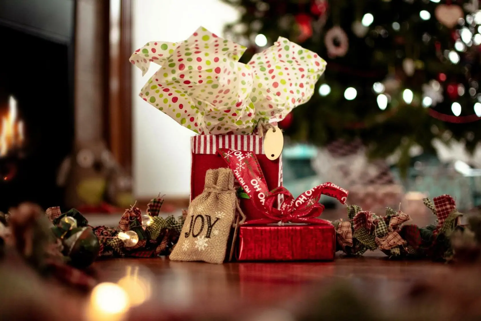 Blog 8 Christmas presents in front of tree