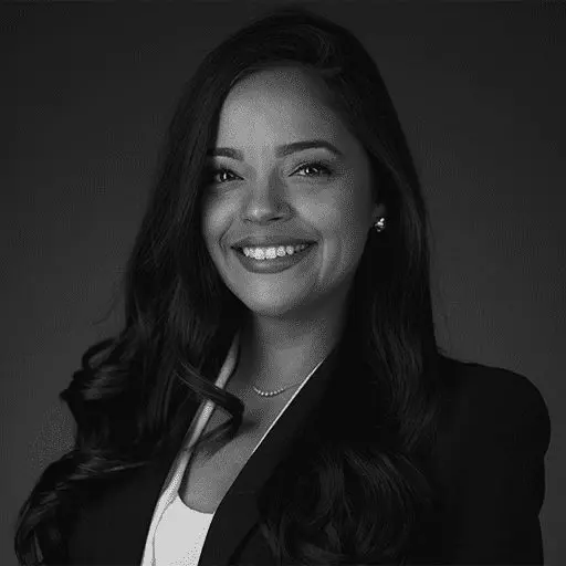 Home 49 Black and white portrait photo of Thomas J. Henry Attorney Jenna Cornejo