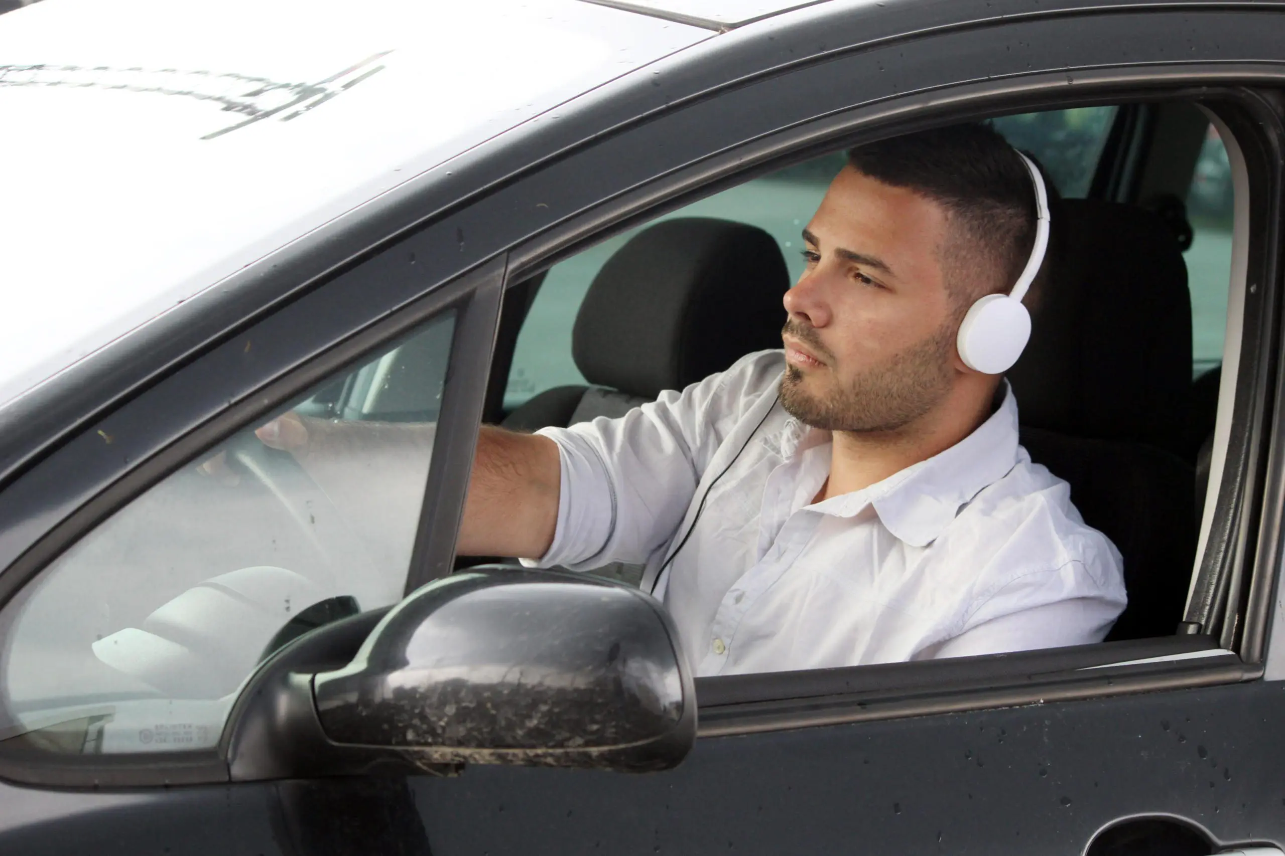 Can You Wear Headphones While Driving? AdobeStock 109957727 scaled