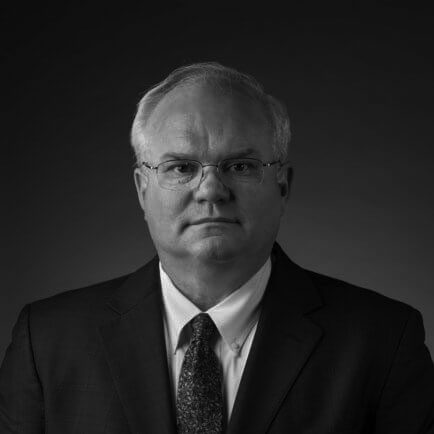 Black and white portrait photo of Thomas J. Henry Attorney Richard W. Hunnicutt, III