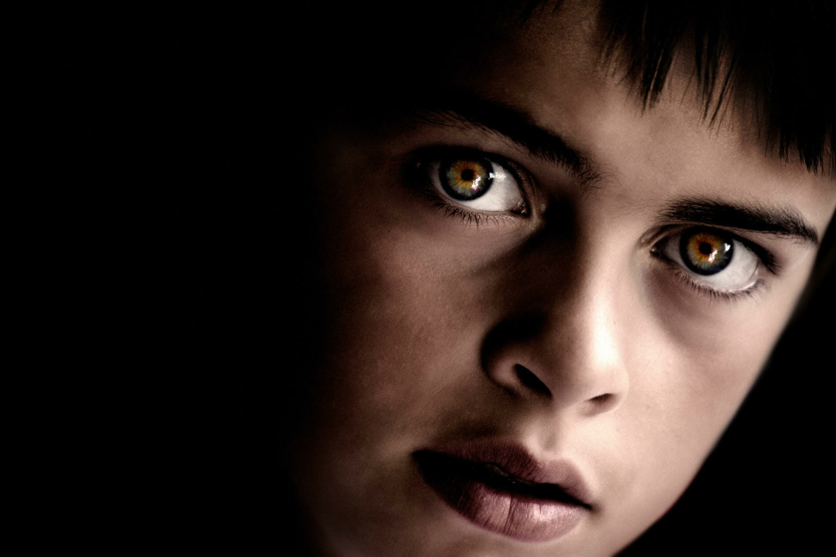 Portrait of Young Boy with Intense Eyes