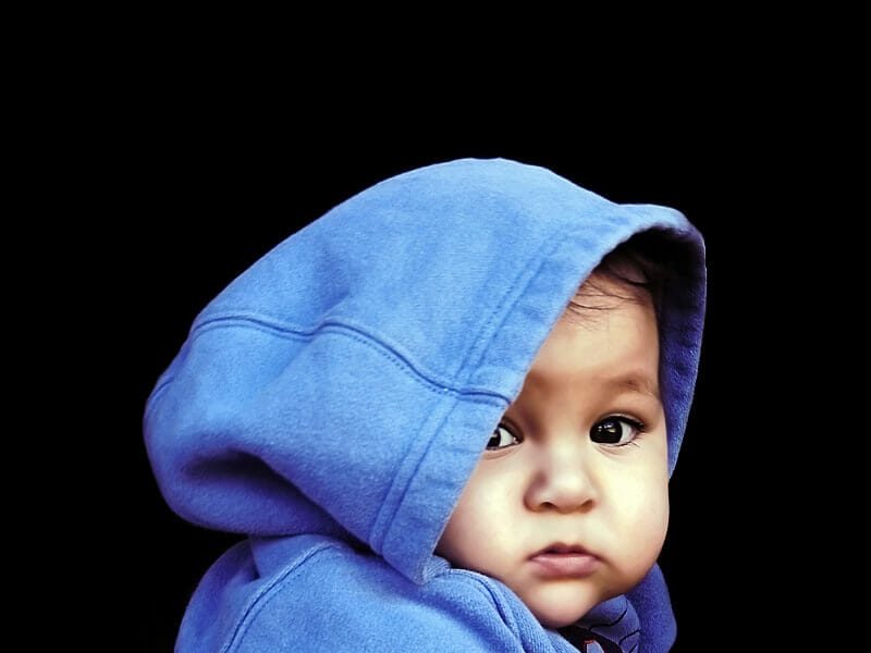Infant in blue hoodie