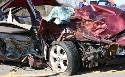 severely damaged car following a crash