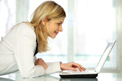 Woman browsing on laptop