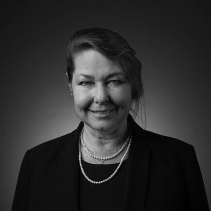 Black and white portrait photo of Thomas J. Henry Attorney Ilse Marie Kirchgraber