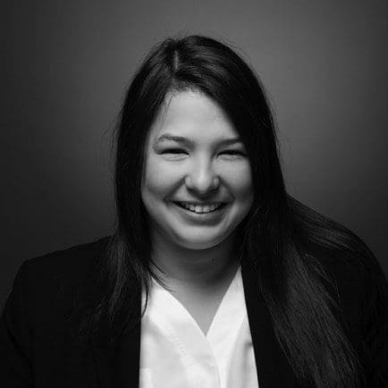 Black and white portrait photo of Thomas J. Henry Attorney Veronica Trevino Tellez
