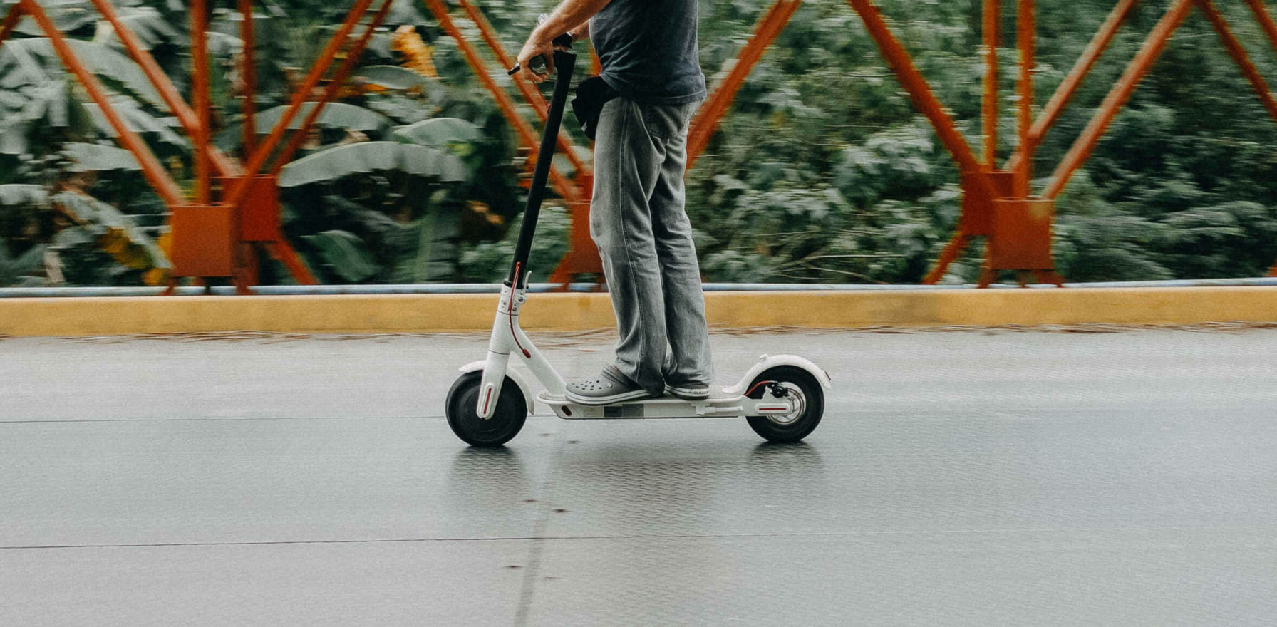 Man riding on scooter
