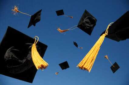 Graduation gaps being thrown into the air