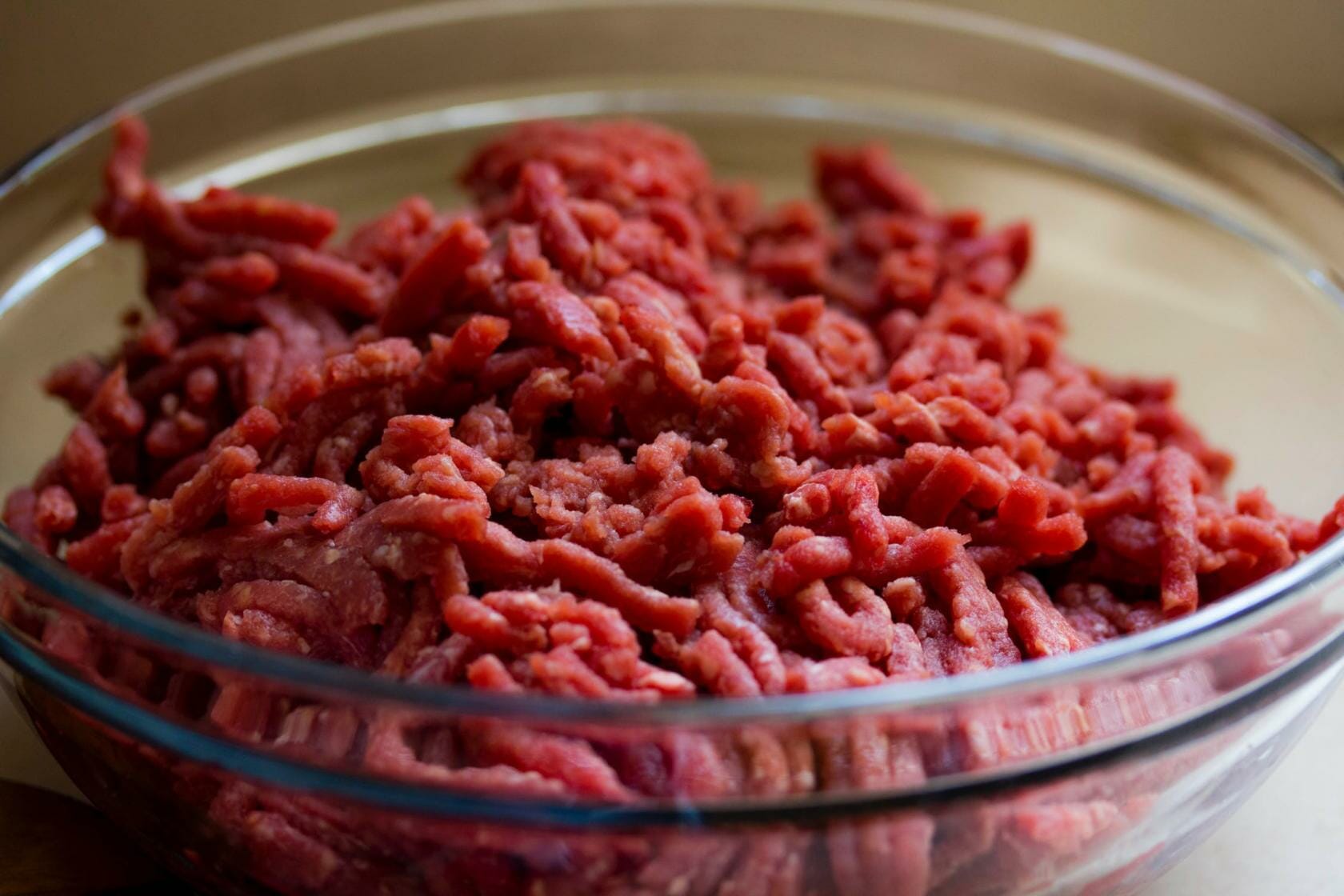Ground beef in glass bowl