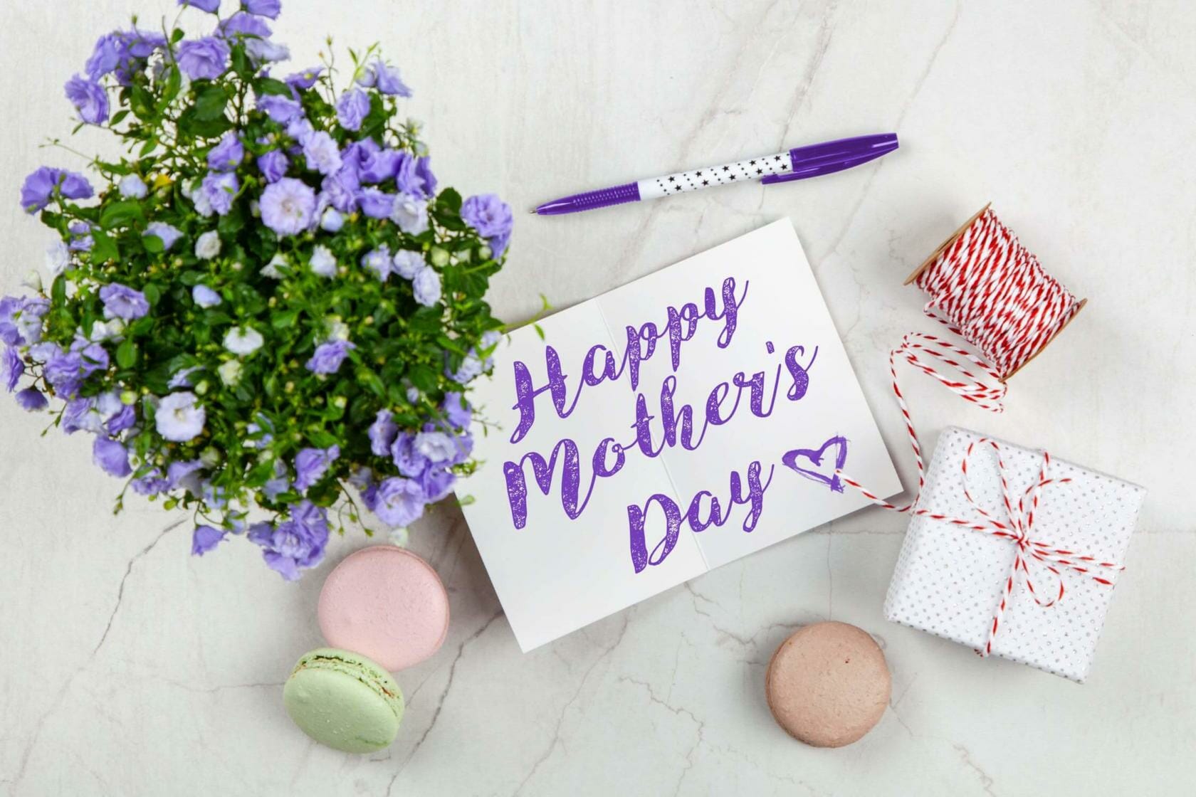 Happy Mother's Day card with flowers and presents