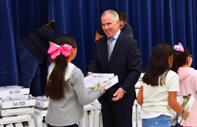 Thomas J. Henry hands out schools supplies in Corpus Christi, Texas