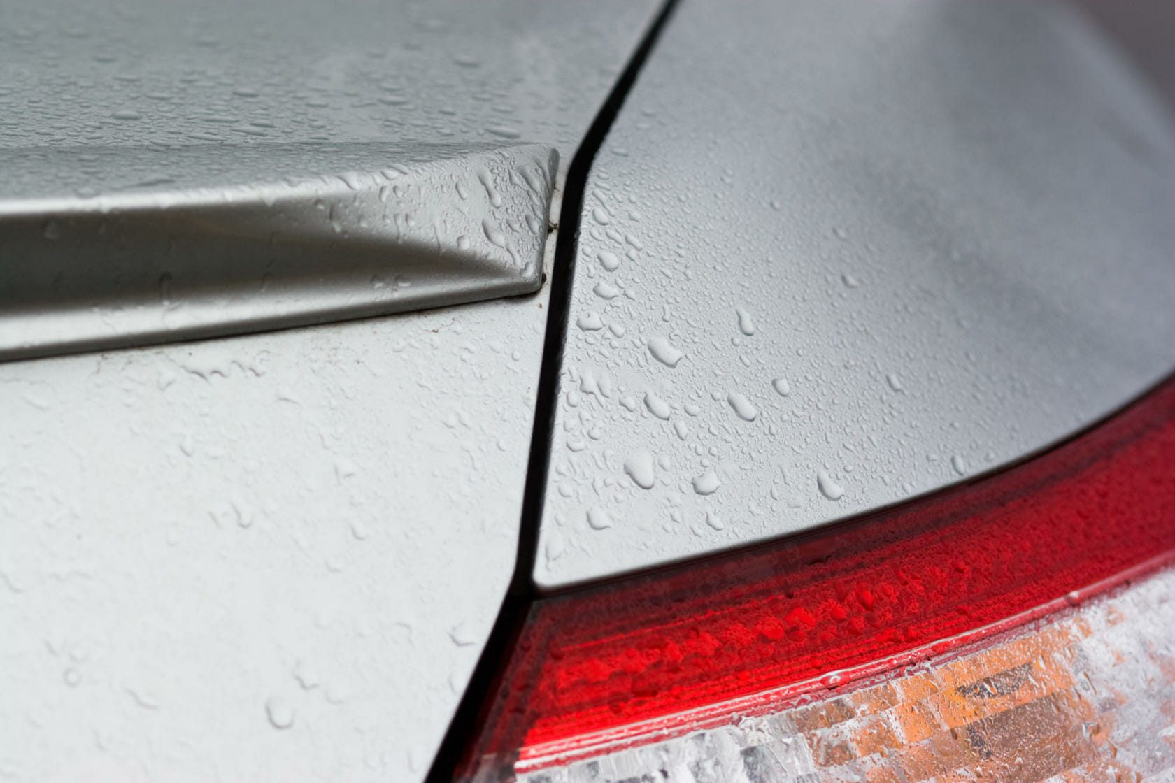 Water droplets on rear bumper and trunk